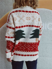 Beige knit sweater with festive tree appliqué and geometric pattern.