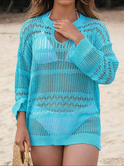 Open-knit beach cover-up in pastel blue with a V-neck and slit hem.