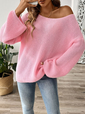Off-the-shoulder ribbed knit pullover sweater in dusty pink with bell sleeves.