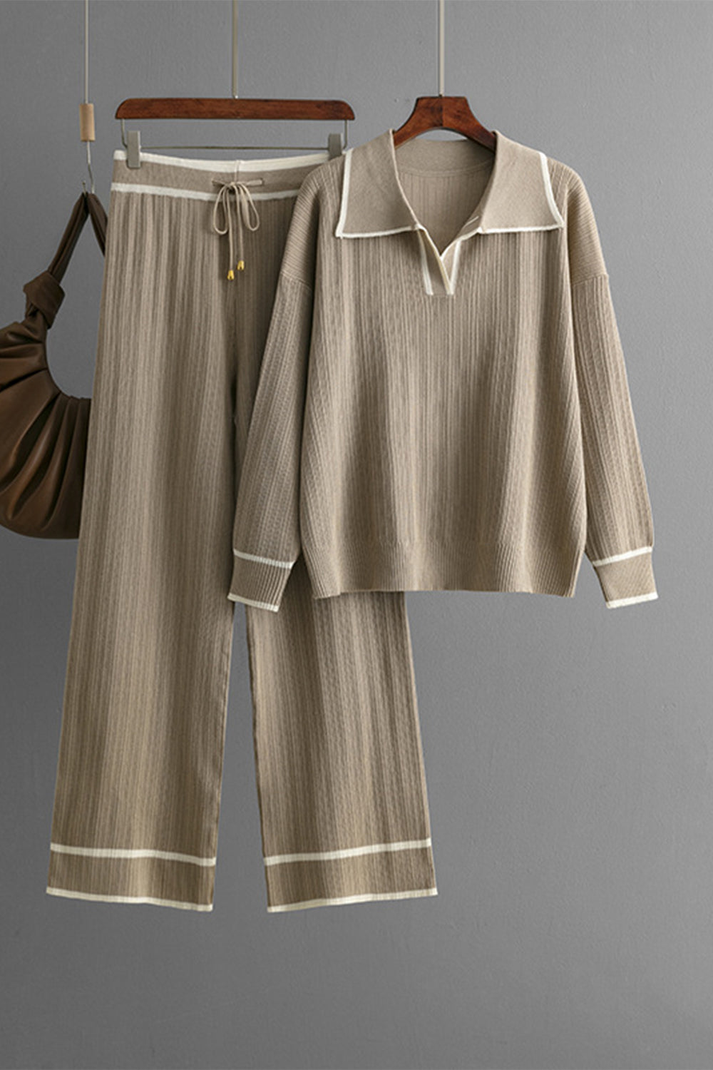 Ribbed knit loungewear set in mocha with contrast trim on collar, cuffs, and pant hems.