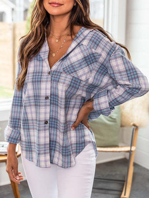 Relaxed fit plaid button-down shirt in light blue with a collared neckline and long sleeves.