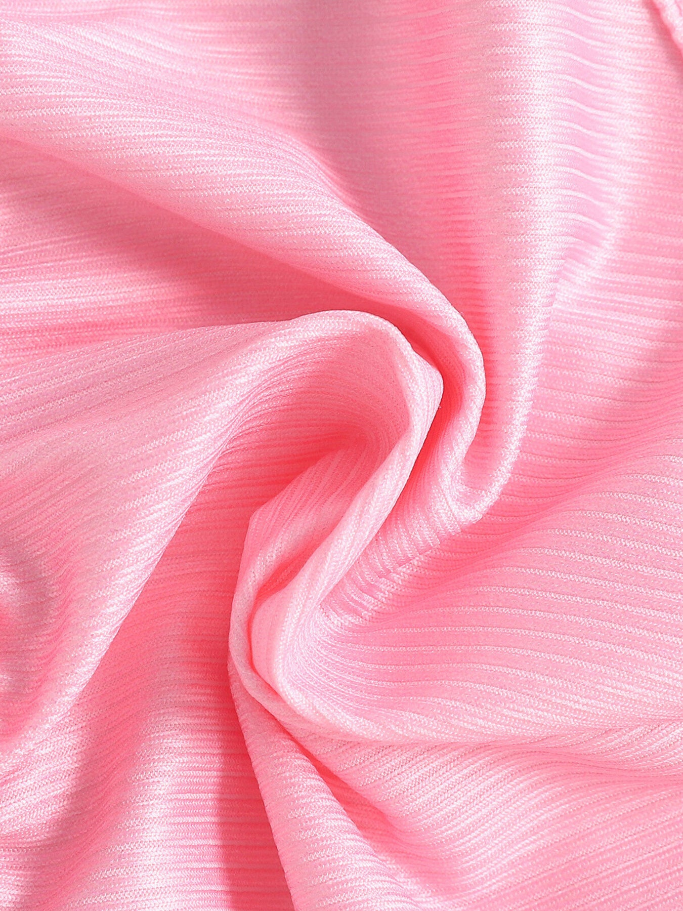Pink ruffled tank top and flare pants set fabric detail