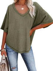 Olive green waffle knit relaxed v-neck t-shirt with short sleeves.