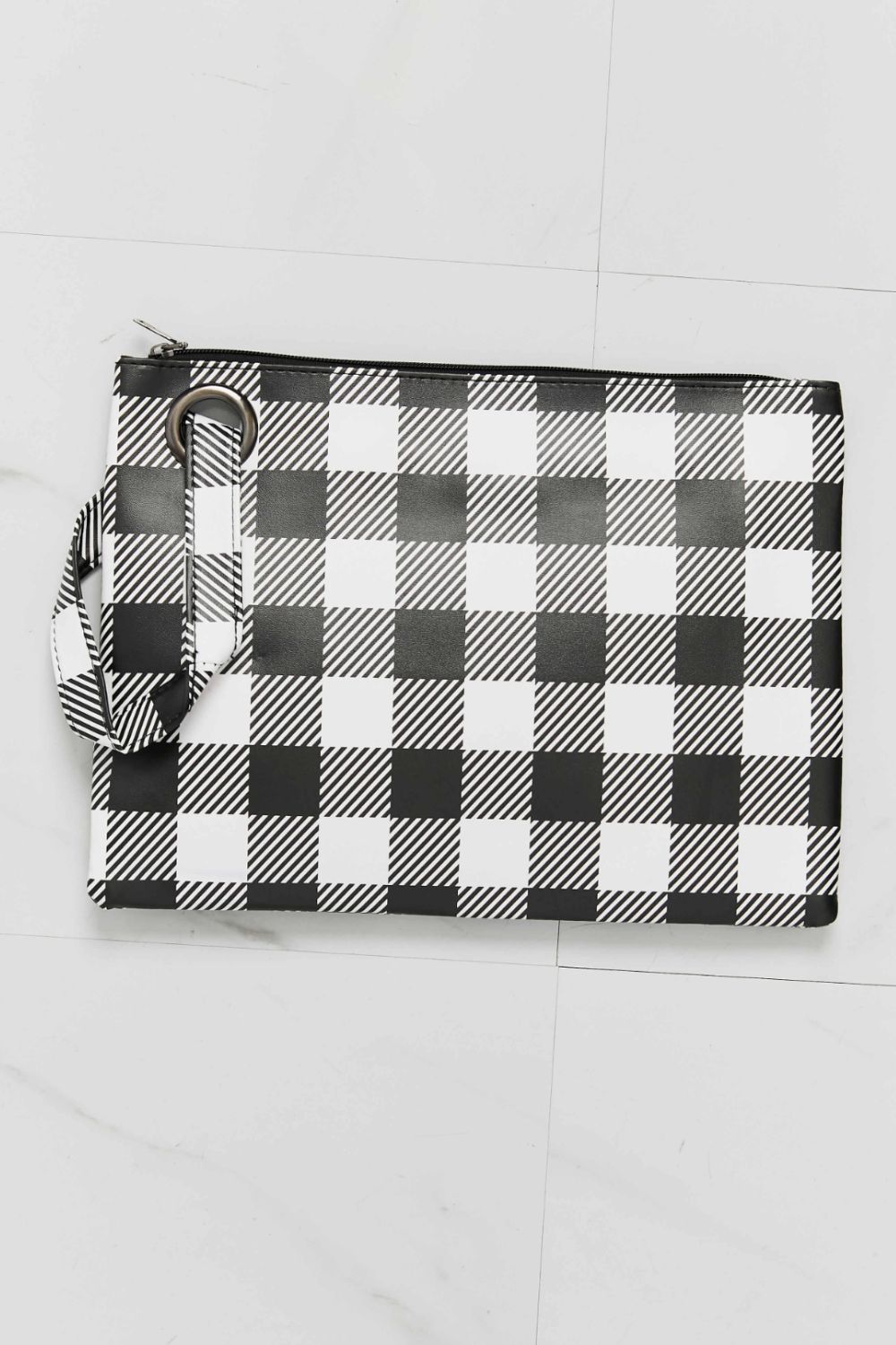 Black and white gingham wristlet pouch with metal ring detail
