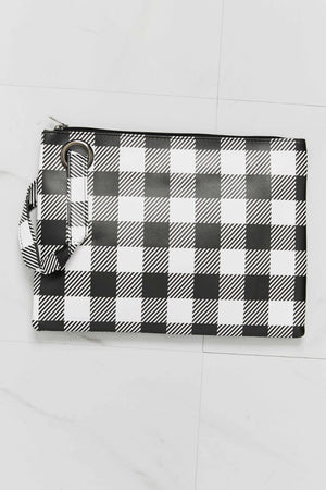 Black and white gingham wristlet pouch with metal ring detail