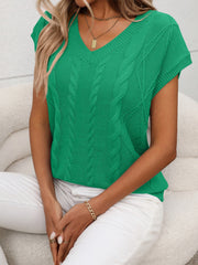 Green cable knit V-neck vest with short sleeves and textured cable detail.