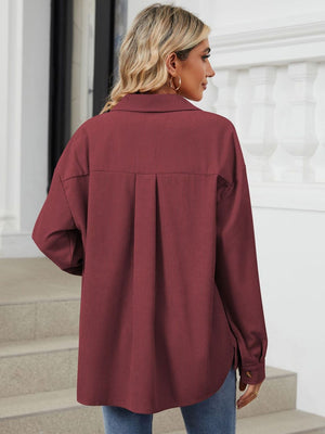 Burgundy corduroy overshirt with back pleat detail and button cuffs.