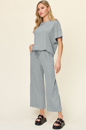 Waffle knit lounge set in Cloudy Blue with drawstring pants and relaxed fit top.