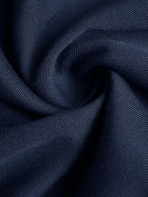 Navy blue midi dress fabric detail with visible texture.