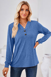 Blue Henley neckline jersey top with button detail and long sleeves.