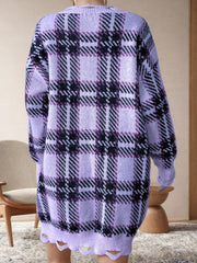 Distressed hemline plaid knit tunic in Pink Purple with a relaxed fit and crew neck.