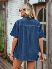Boxy dark blue denim shirt with short sleeves and a relaxed fit.