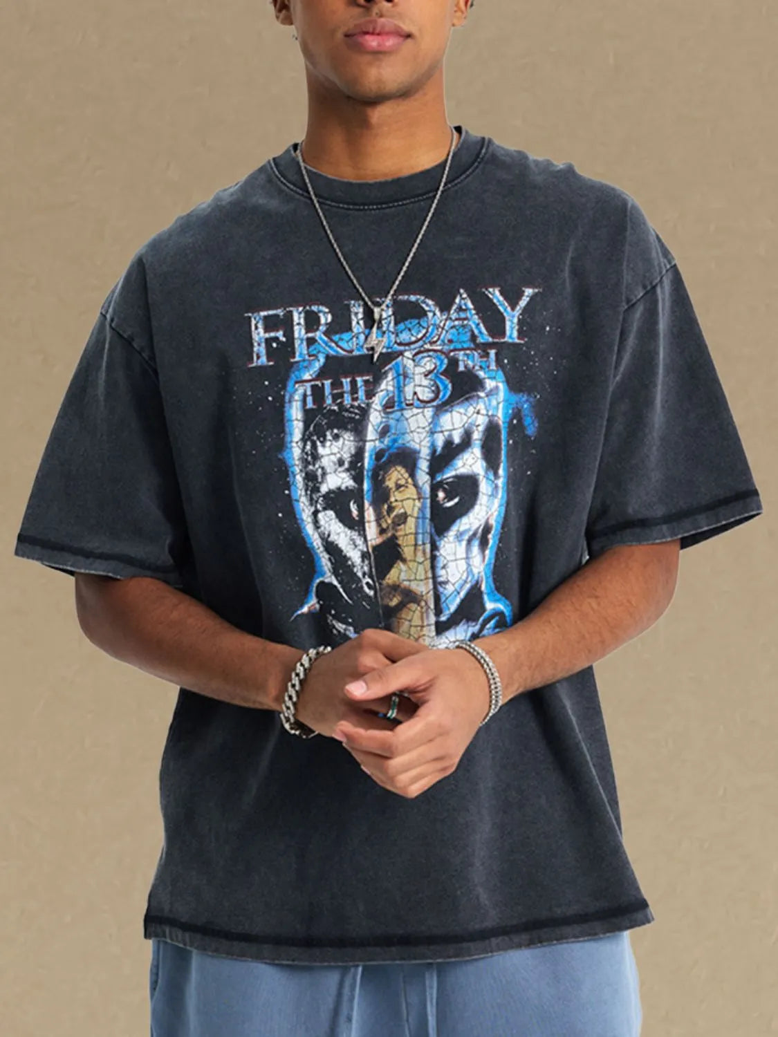 Black vintage wash graphic tee with Friday the 13th print and crew neck.