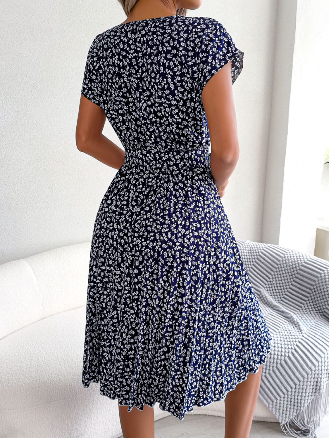 Navy floral print midi dress with tie waist and short sleeves
