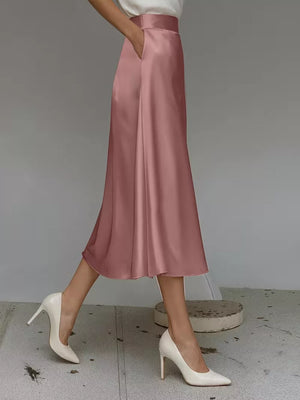 Pink satin A-line skirt with pockets, midi length