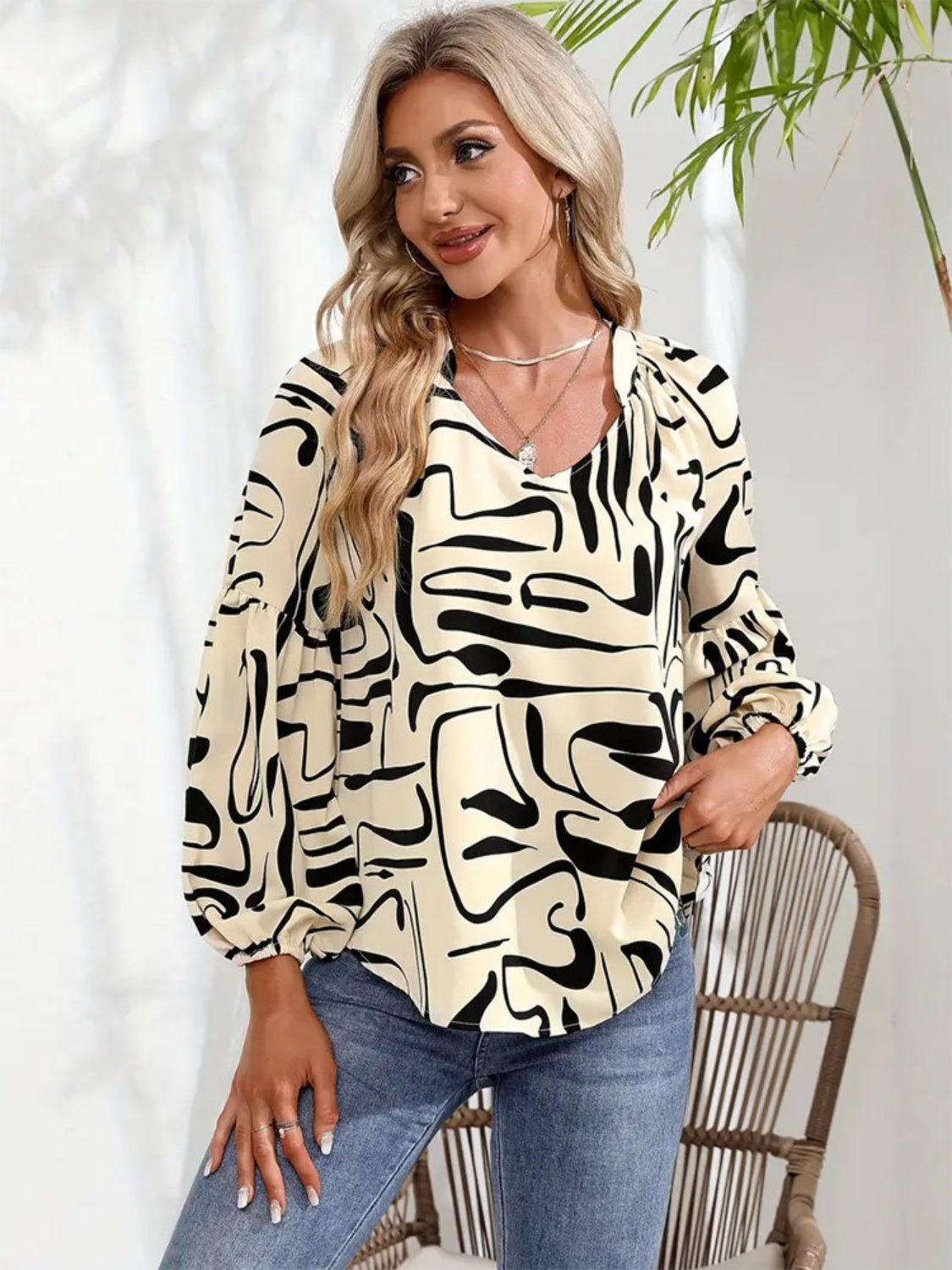 Women's cream abstract scribble print blouson sleeve top
