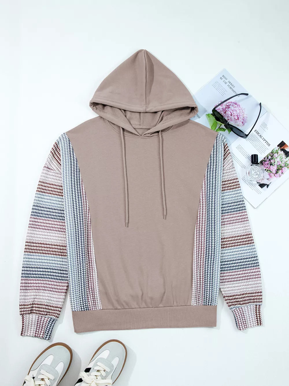 Relaxed fit cotton hoodie with multi-tonal patterned sleeves and drawstring hood.