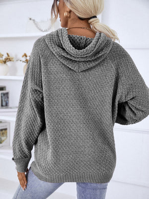Charcoal textured knit raglan sleeve hoodie with a cowl neck and ribbed hem.