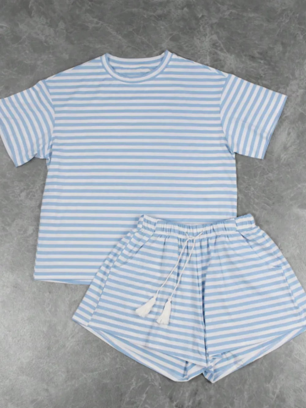 Blue striped tee and drawstring shorts with tassels, casual loungewear ensemble.