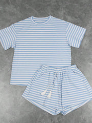 Blue striped tee and drawstring shorts with tassels, casual loungewear ensemble.