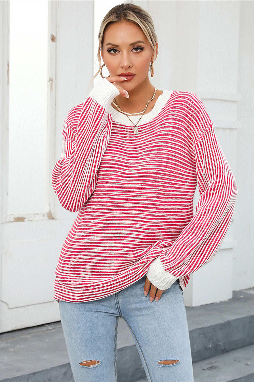 Nautical stripe ribbed knit crewneck sweater in deep rose and white, with crew neckline and long sleeves.