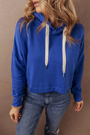 Cobalt cropped hoodie with contrast ties and drawstring hood.