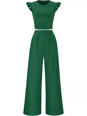 Green ruffled cap sleeve maternity top with ruched waist and wide leg pants.