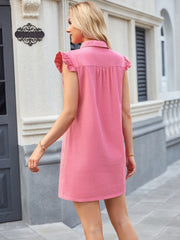 Denim shirtdress in blush pink with flutter sleeves and buttoned collar