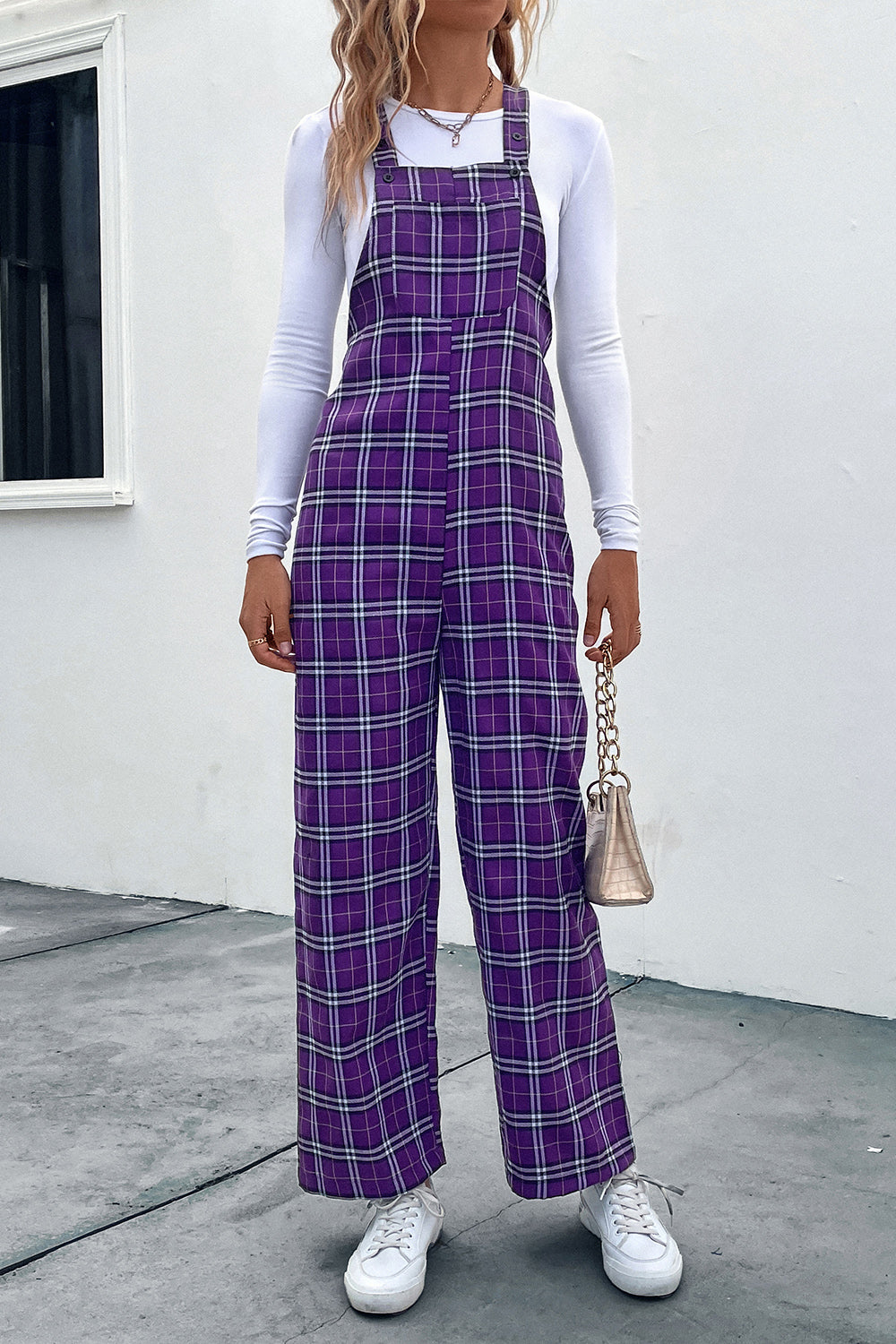 Vivid Violet plaid wide-leg overalls with button straps and a relaxed fit.