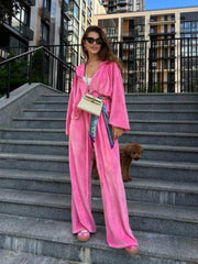 Hot Pink plush velour lounge set with wide leg pants and hooded jacket.