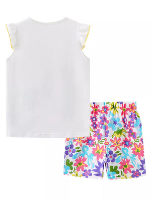 Toddler girls white cotton set with floral print shorts and ruffled yellow trim sleeves.