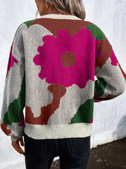 Abstract floral knit sweater with round neck in burgundy, hot pink, green, blue, black, and olive.