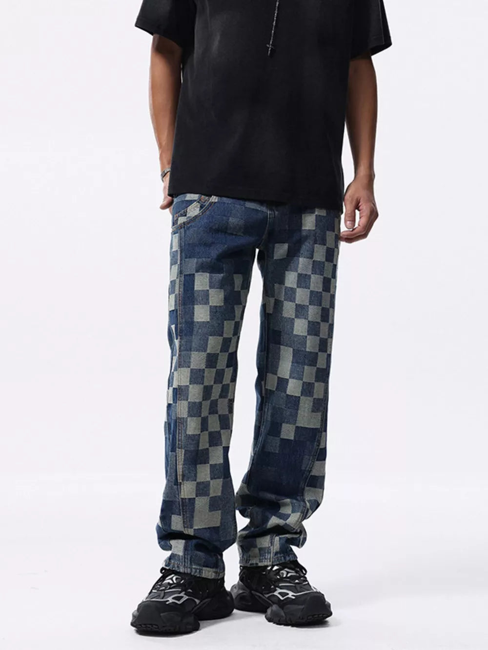 Checkerboard pattern relaxed fit jeans in blue denim with a contemporary checkered design.
