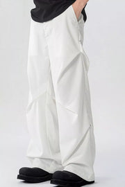 White men's wide-leg sweatpants with pockets and a relaxed fit.