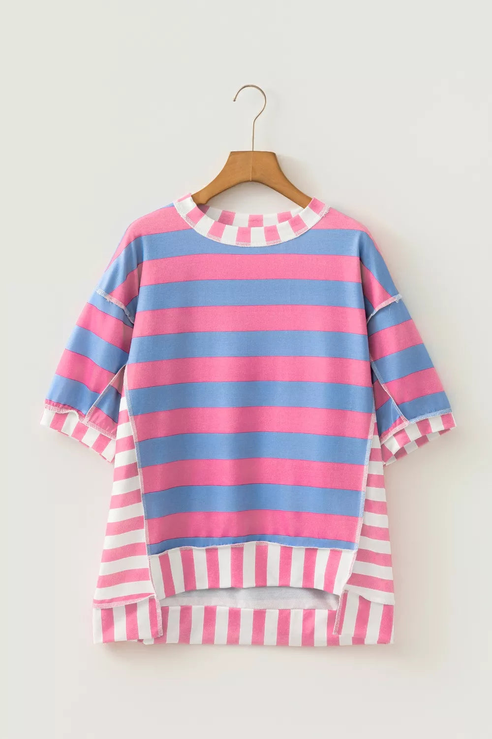 Oversized striped maternity overshirt with patchwork details and a checkered neckline.