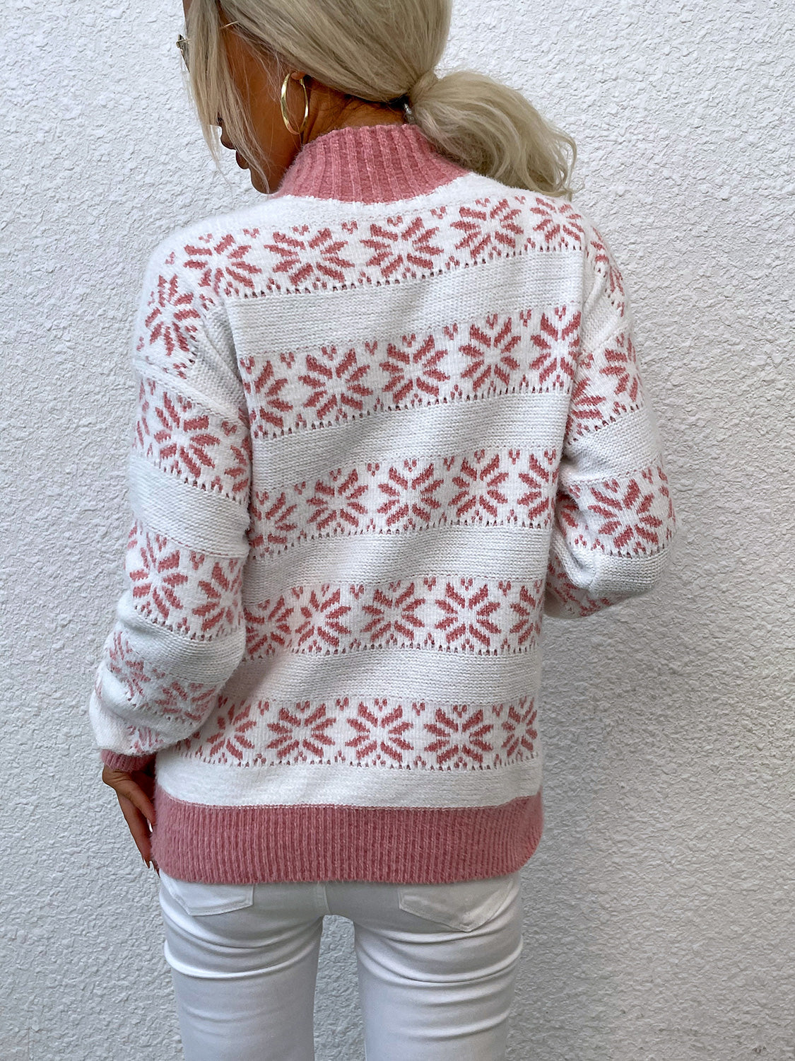 Alpine Fair Isle mock neck pullover sweater in white with pink snowflake pattern and pink trim.