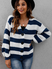 Chunky stripe cardigan with balloon sleeves in navy and white acrylic, featuring a V-neck and button front.