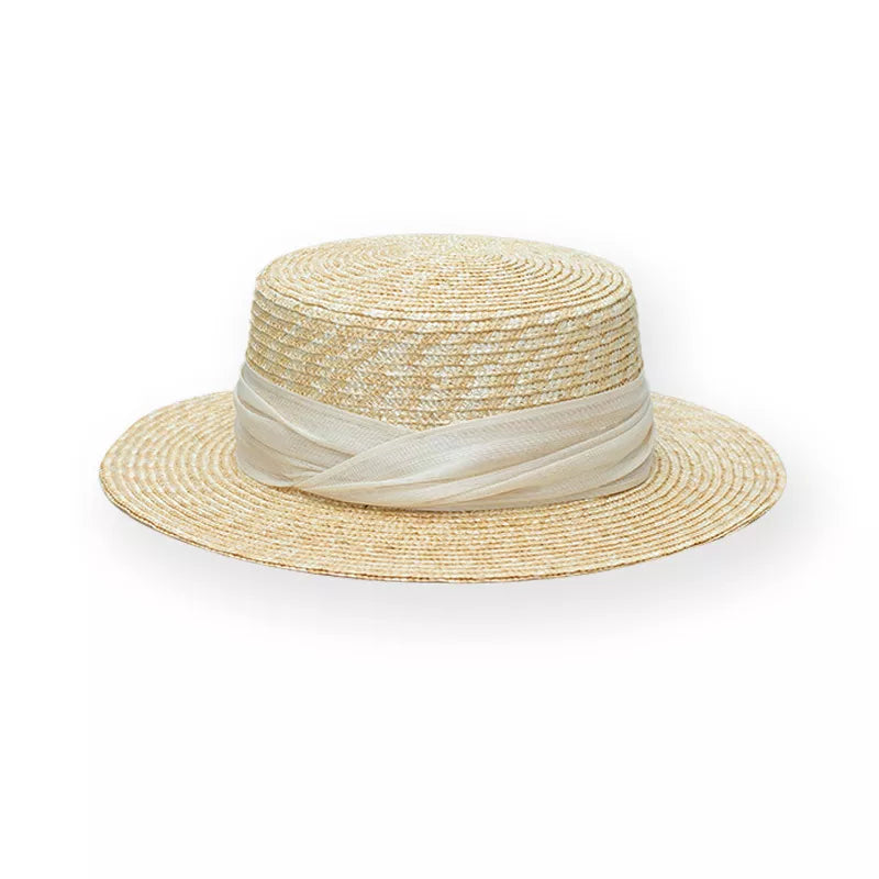 Elegant straw boater hat in tan with a sheer ribbon trim