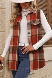 Plaid utility vest in terracotta with button front and patch pockets, 100% polyester.