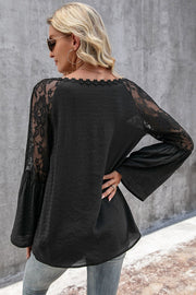Black lace sleeve blouse with scallop trim neckline and bell sleeves.