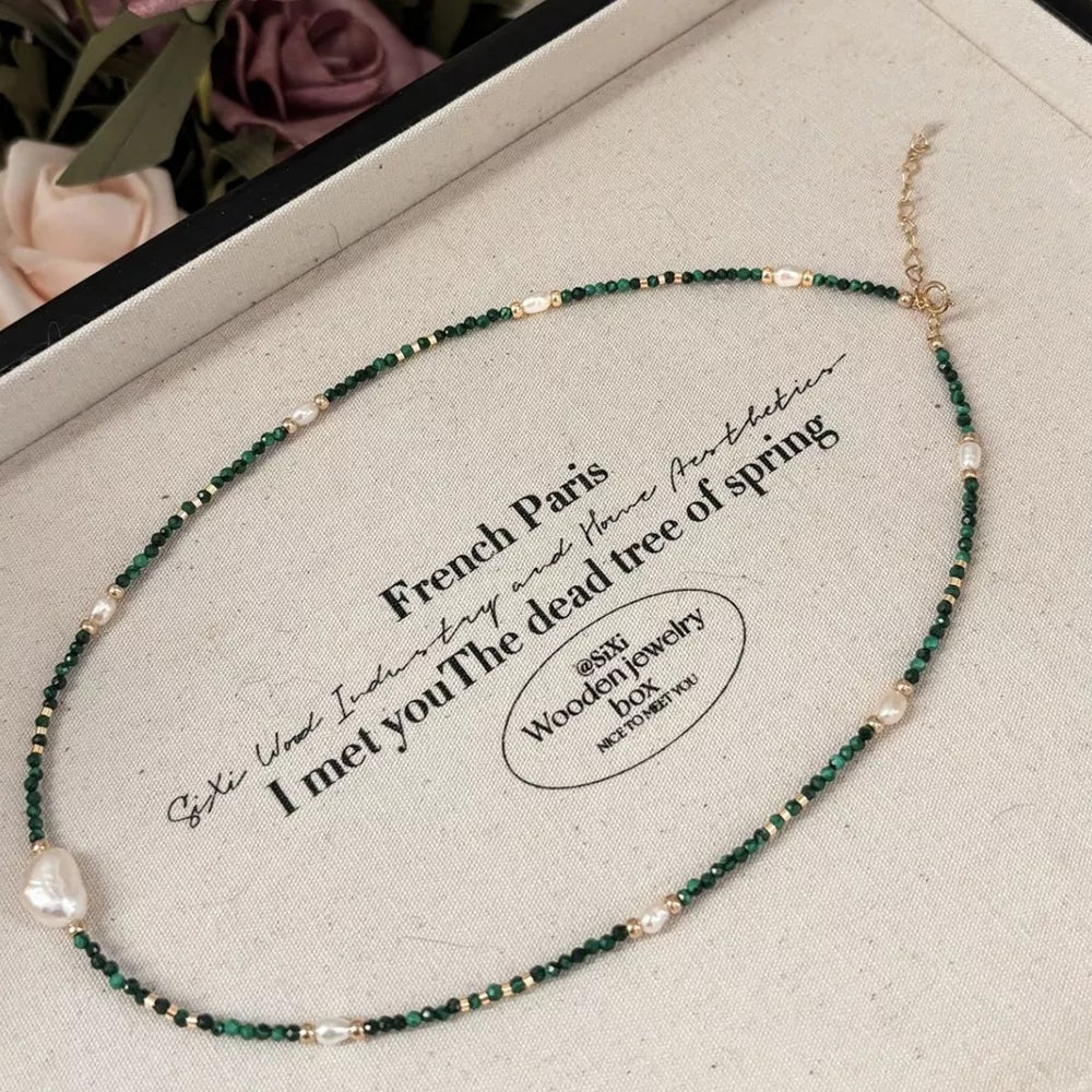 Elegant freshwater pearl and malachite beaded necklace with gold accents
