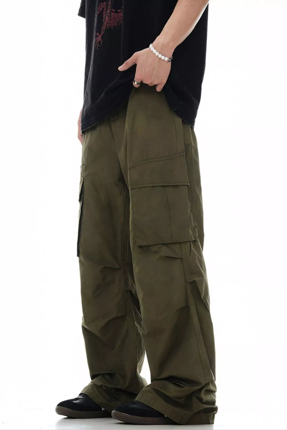 Olive green relaxed fit cargo pants with multiple pockets.