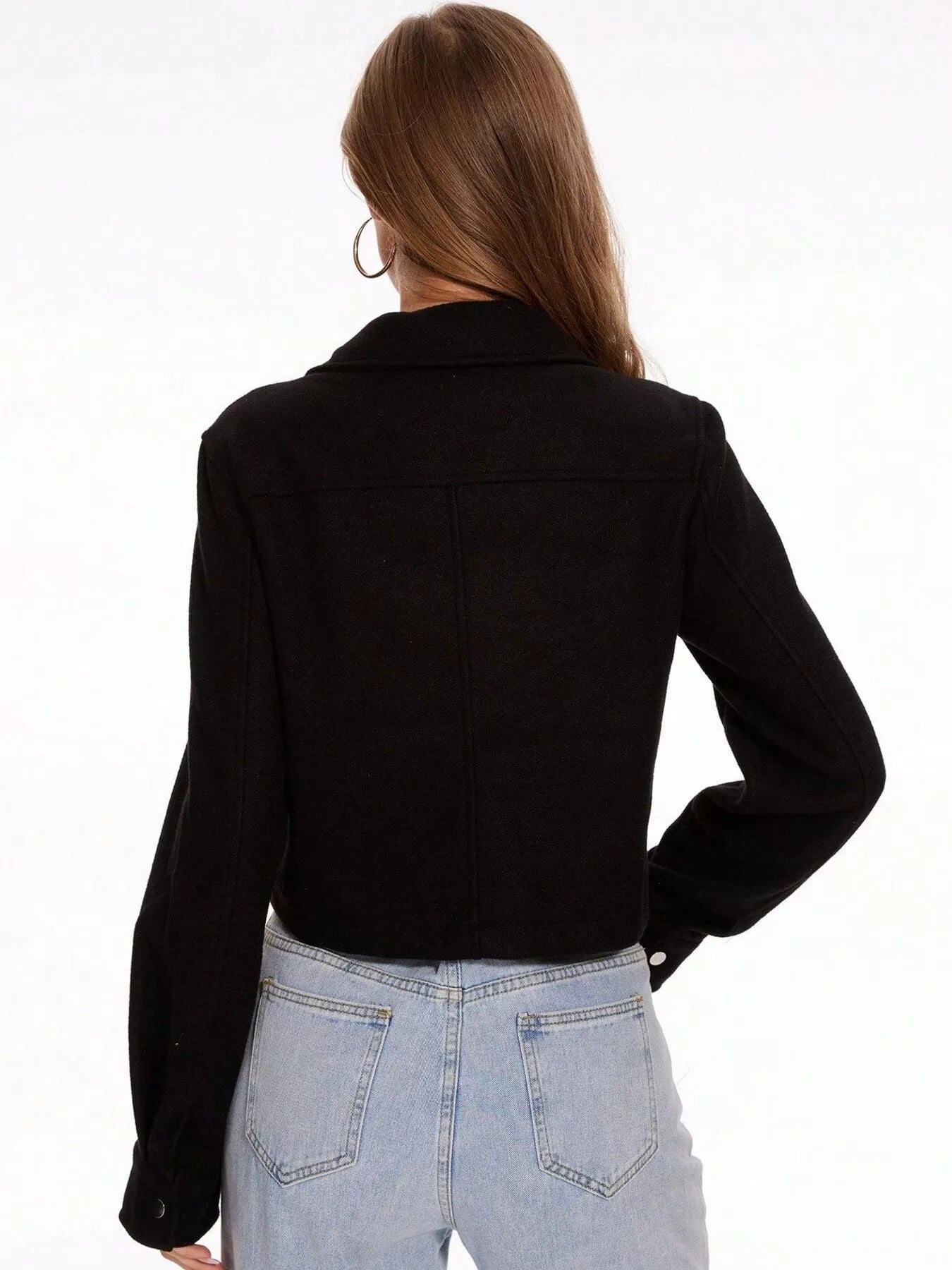 Black trucker jacket with snap buttons and long sleeves, shown from the back.
