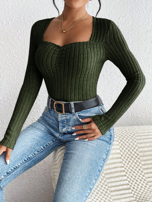 Army green ribbed bodysuit with sweetheart neckline and long sleeves.