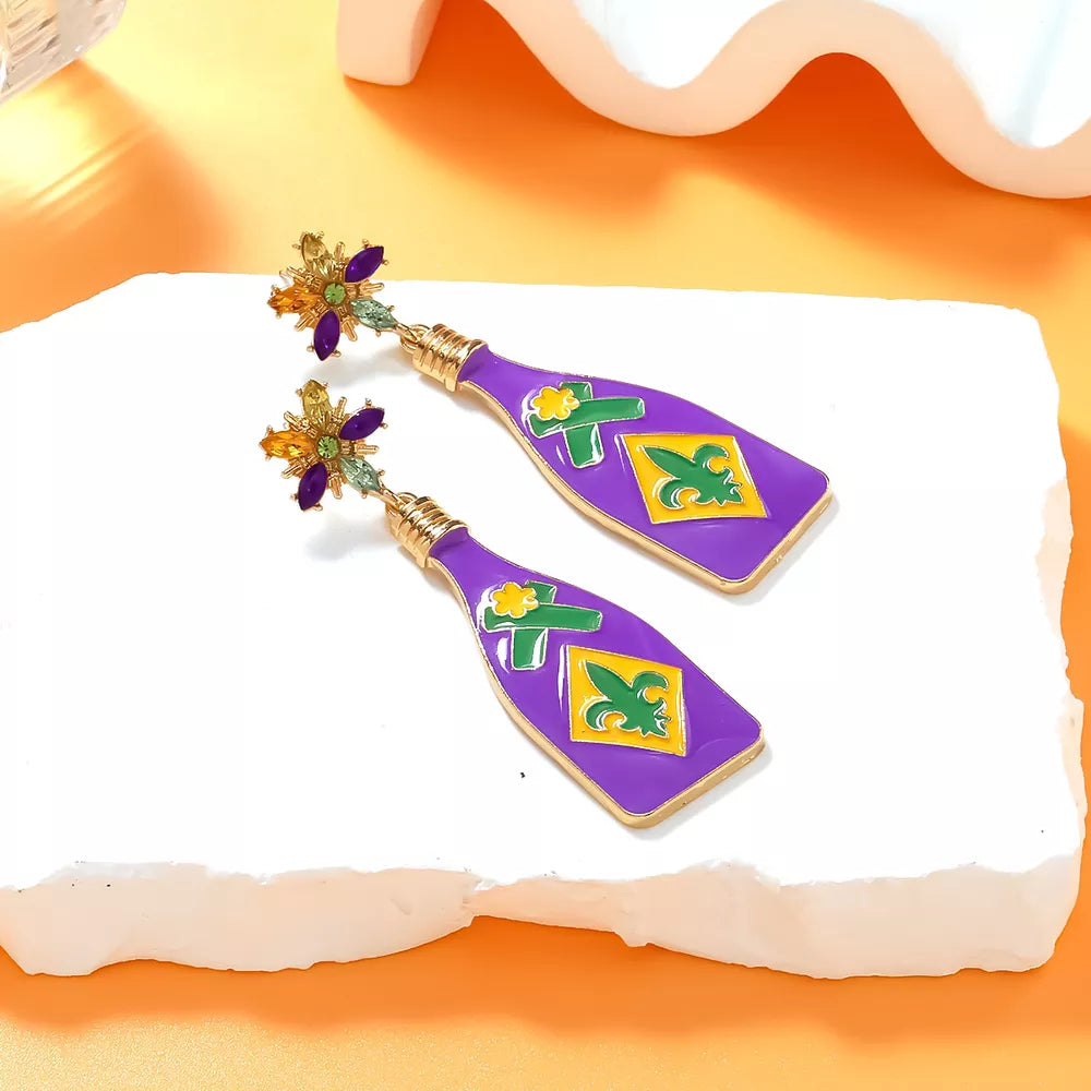 Mardi Gras celebration dangle earrings with purple bottle design, fleur de lis, and jeweled tops.