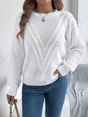 White chevron knit sweater with eyelet detail and crew neck.