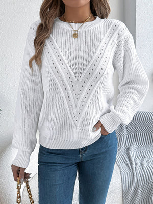 White chevron knit sweater with eyelet detail and crew neck.