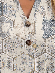 Bohemian tapestry henley blouse with button detail and geometric pattern