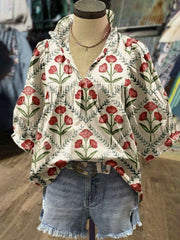 Ruffle collar blouse with red floral print and ruffled trim, V-neck, short sleeves.