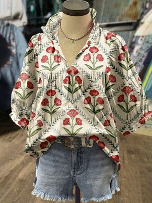 Ruffle collar blouse with red floral print and ruffled trim, V-neck, short sleeves.